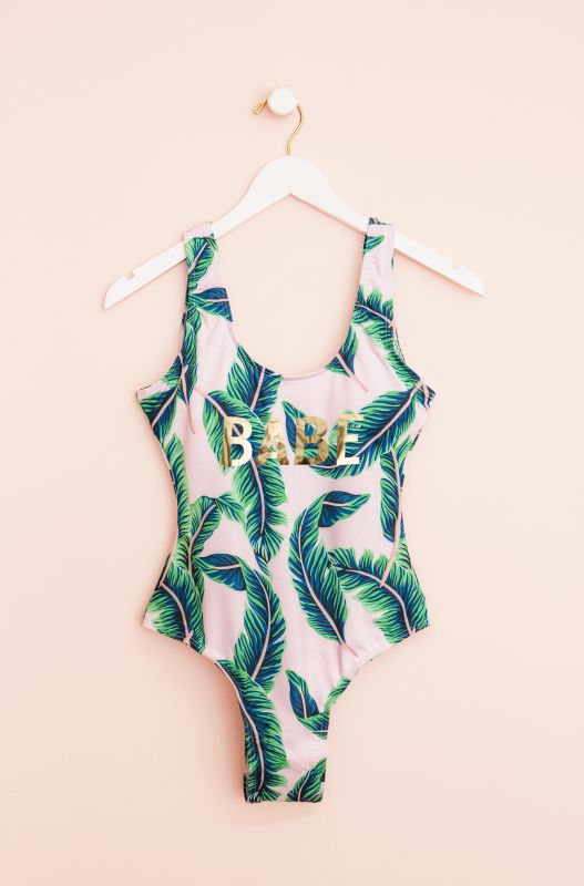 Palm leaf bachelorette party swimsuits