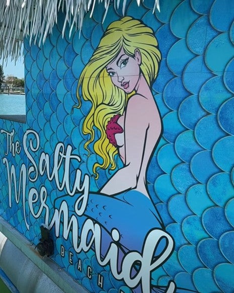 The Salty Mermaid Beach Boats