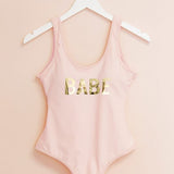 Palm leaf bachelorette party swimsuit