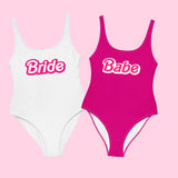 Retro Barbie bachelorette party swimsuits